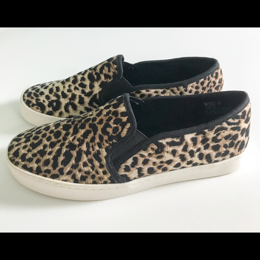 Report cheetah print slip on shoes